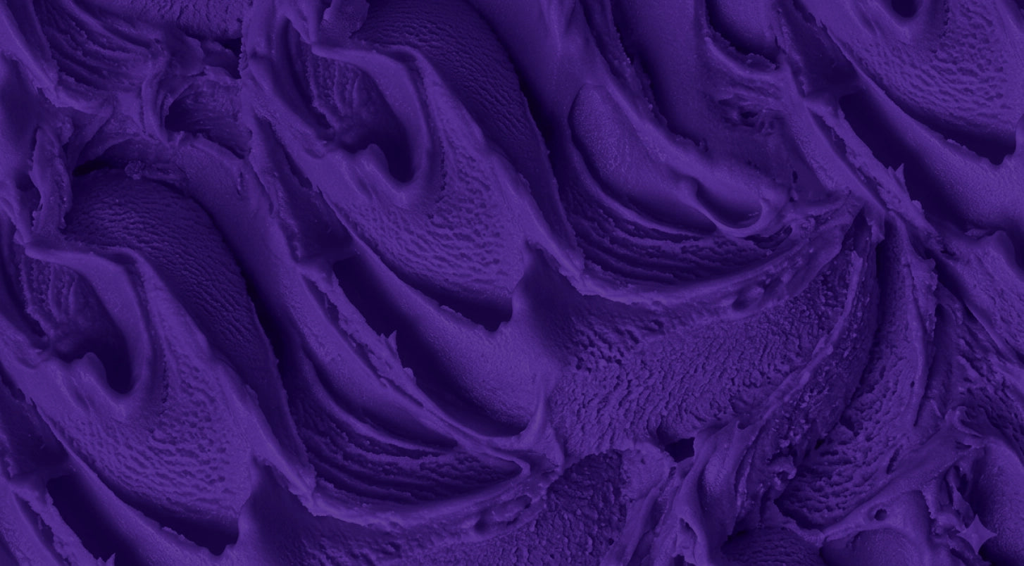 Close-up texture of swirled gelato tinted in Daire brand purple