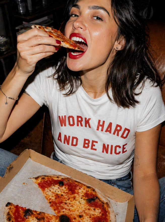 Daire customer eating a slice of pizza from the box — happy dairy moment