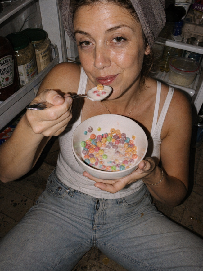 Daire customer eating cereal with milk straight from the fridge — late-night dairy without planning
